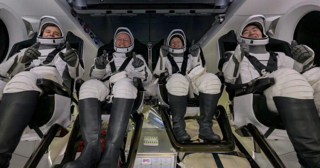 Astronauts say the ultrasound machine was very useful in diagnosing the medical emergency. Also, they look extremely happy and are holding up a finger for "first"