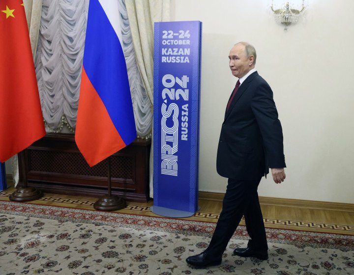 Russian leader Vladimir Putin enters the hall during the BRICS Leader's Summit, October 22 2024, in Kazan, Tatarstan Republic, Russia. Putin and representatives of 30 countries are gathering in Kazan for the 16th BRICS Summit today. (Photo by Contributor/Getty Images)