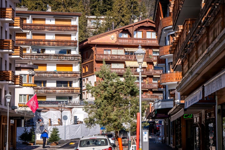 A photograph taken on January 1, 2026 shows a general view of the street and of the bar Le Constellation marked out by a forensic tent following a fire that ripped through the venue in Crans-Montana during New Year's Eve celebrations. (Photo by MAXIME SCHMID / AFP via Getty Images)