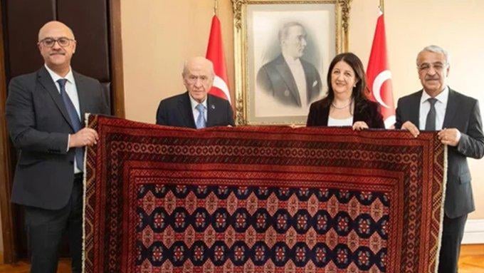 Chief Terrorist Öcalan presented a specially woven rug to Devlet Bahçeli.
