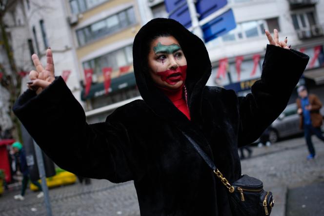 A woman, her face painted in the colors of Iran, at a rally in support of the Iranian people, Istanbul, Turkey, January 11, 2026.