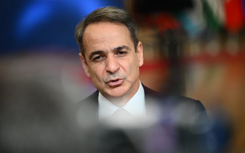 Mitsotakis says he’s ‘overwhelmed’ by soccer fans’ deaths in Romania