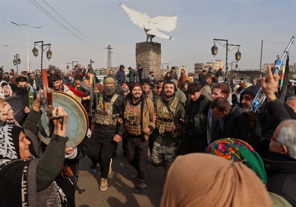 U.N. aid convoy delivers supplies to besieged city in northeast Syria as a shaky ceasefire holds