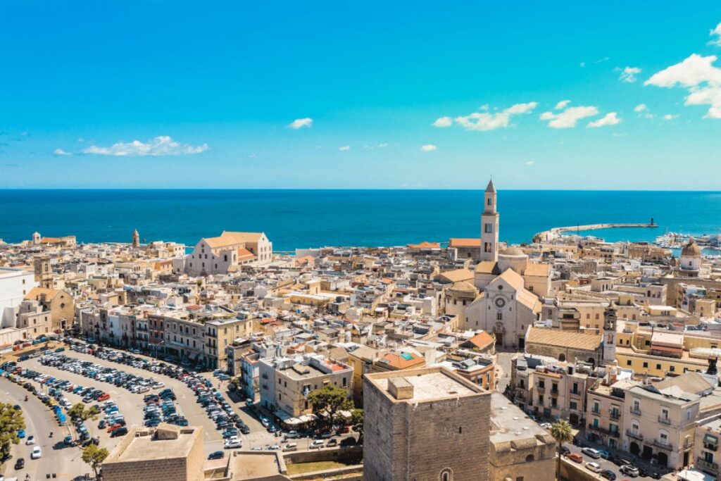 5 Lesser Known European Cities Set To Surge In Popularity This Year Aerial view of Bari old town. On the left there is Bari Cathedral (Saint Sabino), on the left there is San Nicola Basilica, Bari second Cathedral. These churches were built during middle ages.