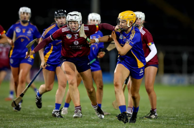 Athenry’s Lisa Casserly and Sofia Daly of St Finbarr's. Photograph: Ryan Byrne/Inpho