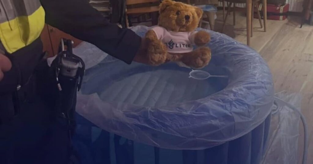 Young people pelt police officers with fireworks during the rescue of a newborn baby