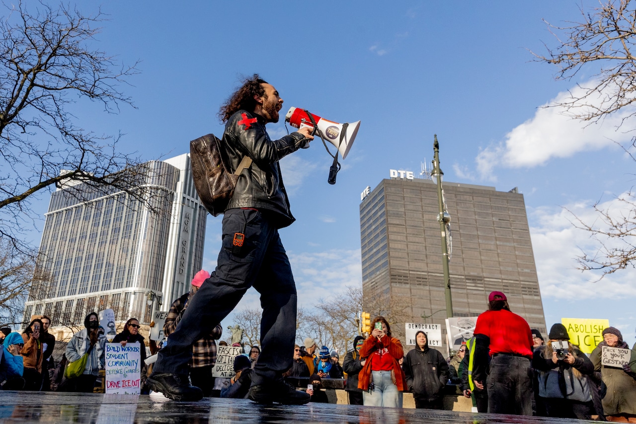 Protesters clash with police, Trump supporters in march in Detroit streets