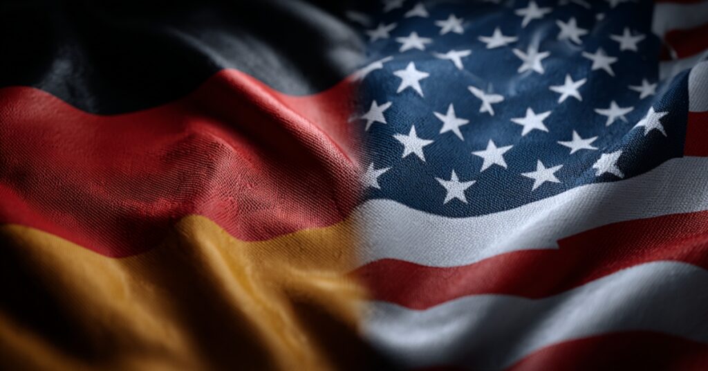 If Germany, The Largest Economy in Europe, were a US state, its GDP Per Capita Would Rank 48th German and U.S. flags side by side, illustrating a GDP Per Capita comparison between the two economies