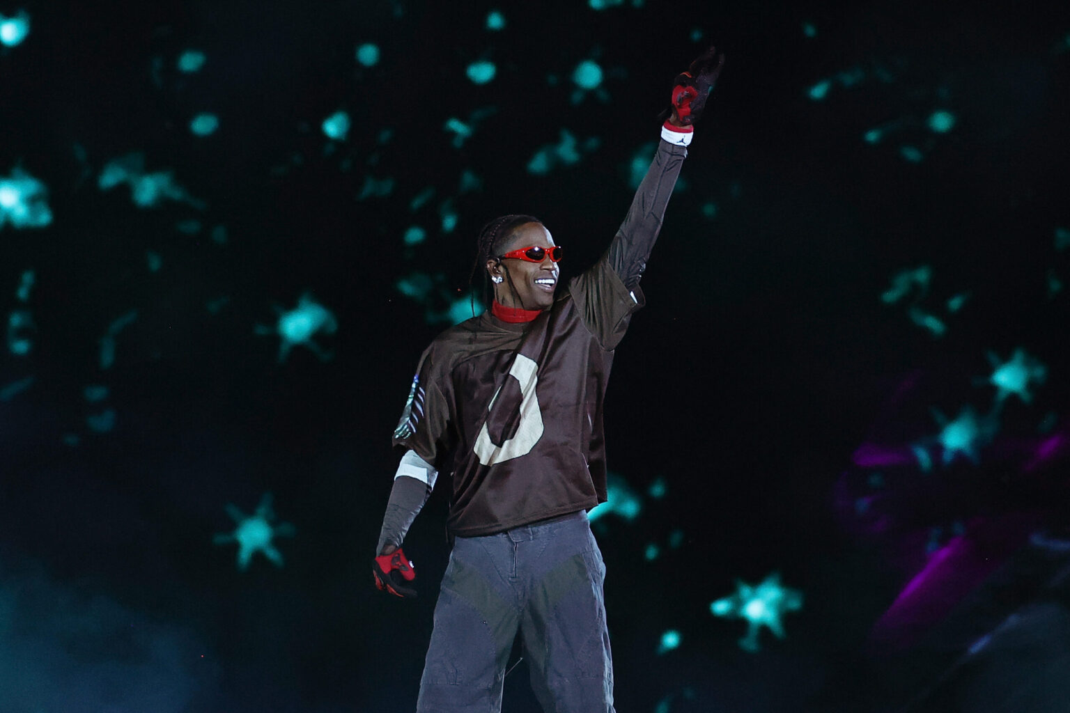 Travis Scott Warns Of War In 'The Odyssey' TV Ad