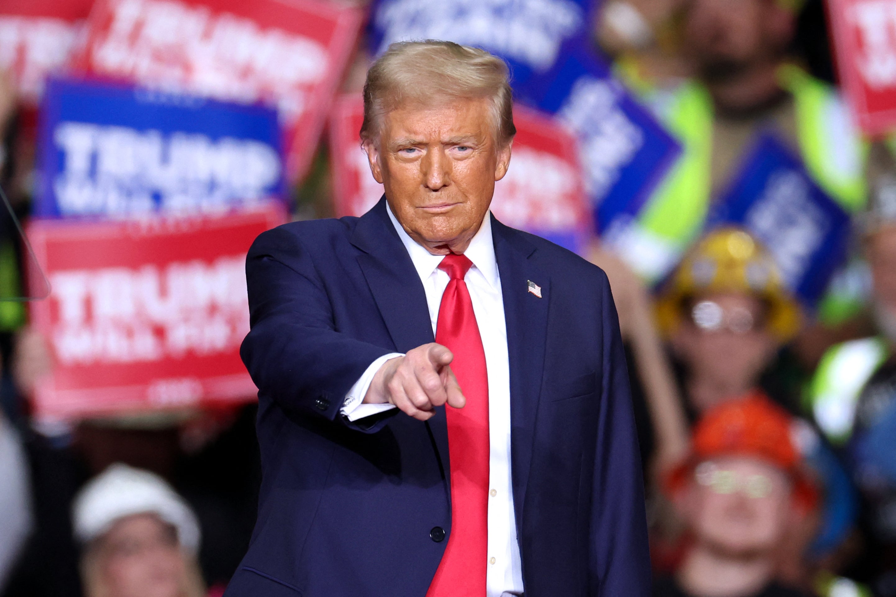 Donald Trump gestures during a campaign rally at PPG Paints Arena in Pittsburgh