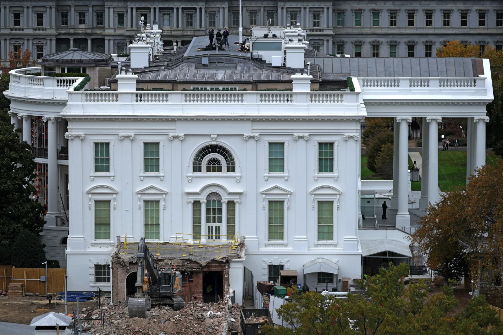 An excavator sits on the rubble after the East Wing of the White House was demolished on October 28, 2025 in Washington, DC