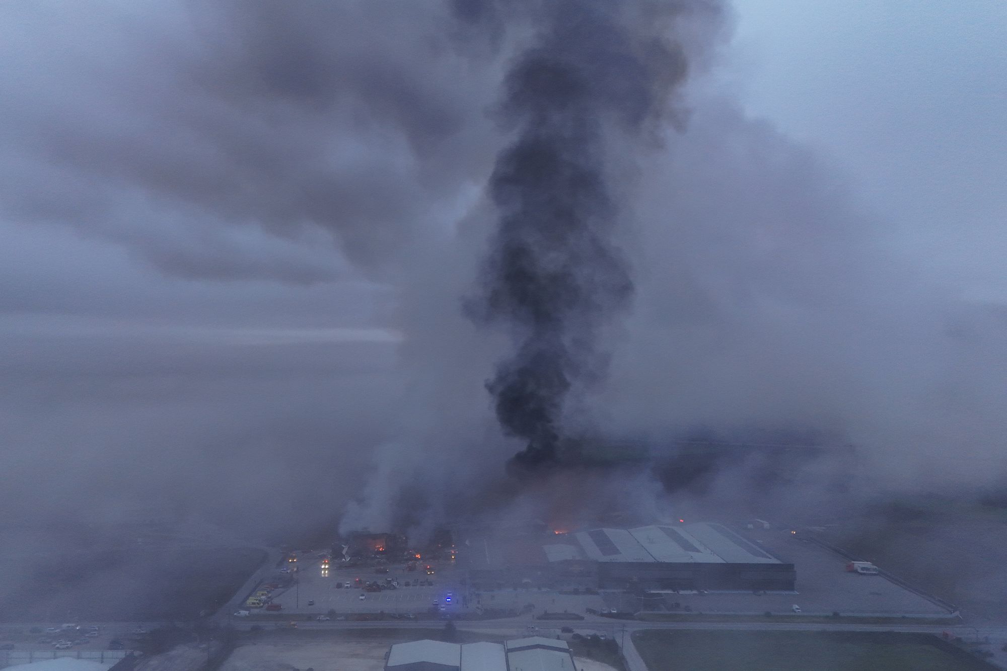 About 40 firefighters and 13 trucks tackled the fire engulfing the industrial facility