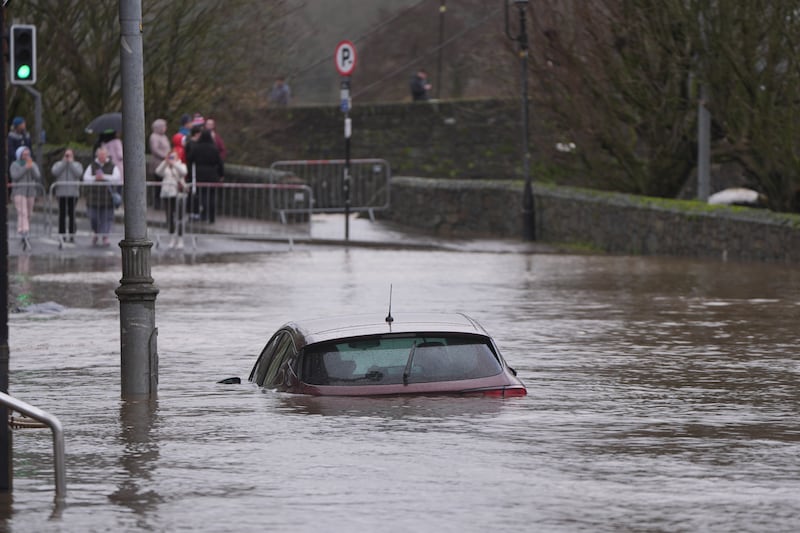 A car is engulfed in floodwater in Enniscorthy, Co Wexford.
Photograph: Niall Carson/PA Wire