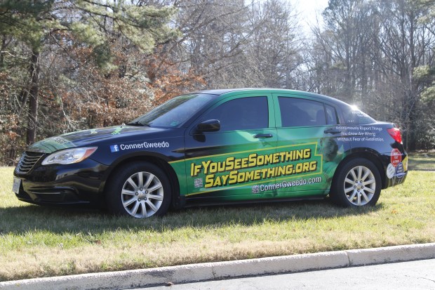 The event showcased a car with the tipline to If You See Something Say Something platform. (James W. Robinson/The Virginia Gazette)