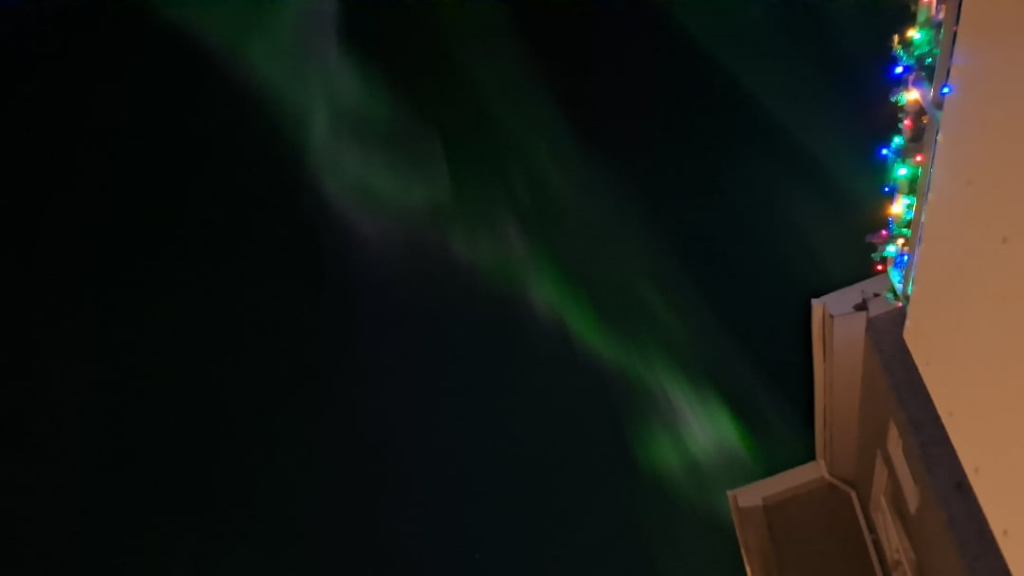 Aurora Borealis over Reykjavik tonight.