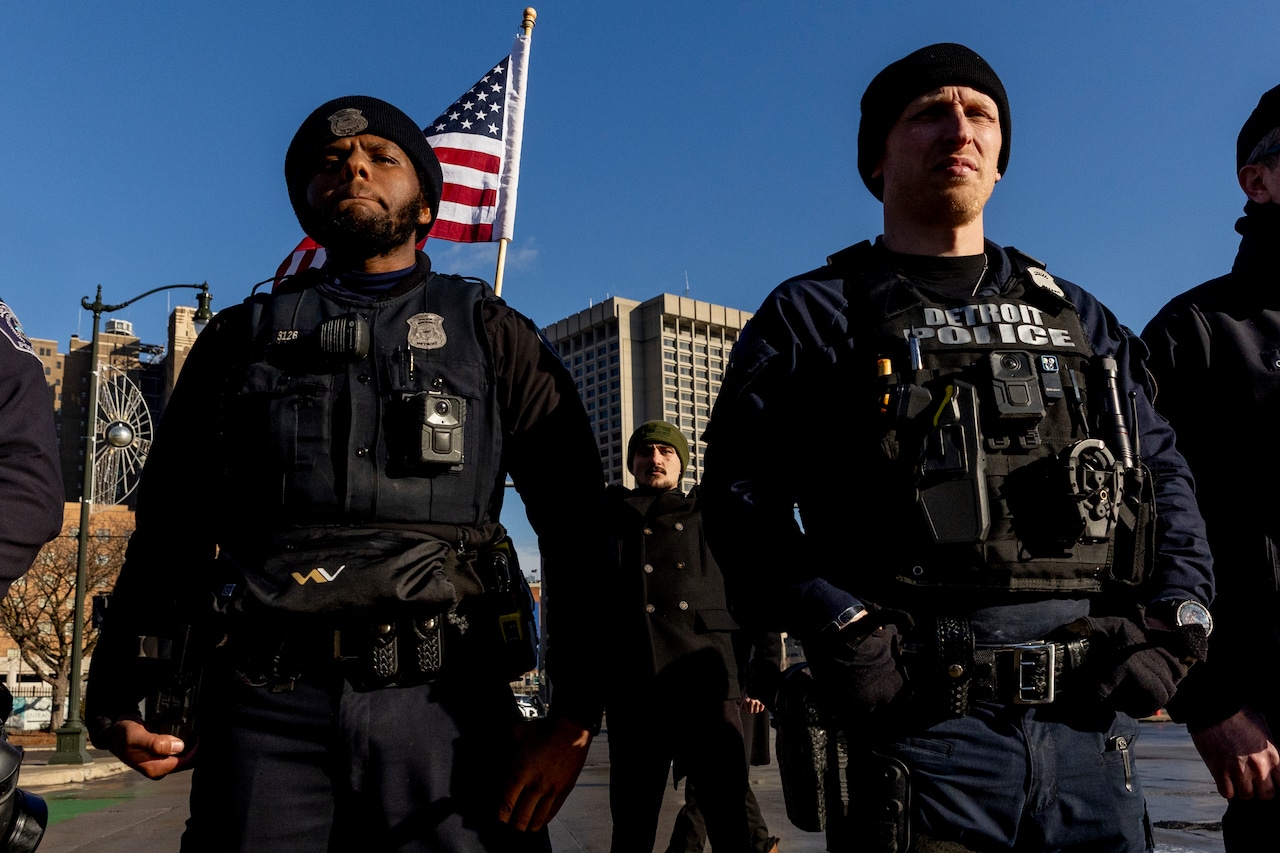 Protesters clash with police, Trump supporters in march in Detroit streets