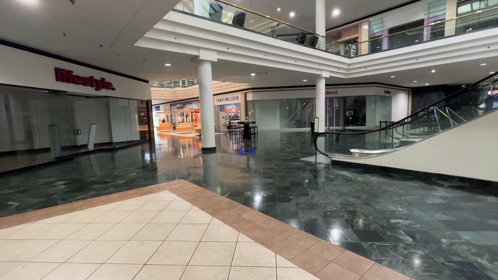 Quiet interior of the once-bustling Oak Court Mall, Wednesday, Jan. 14, 2026