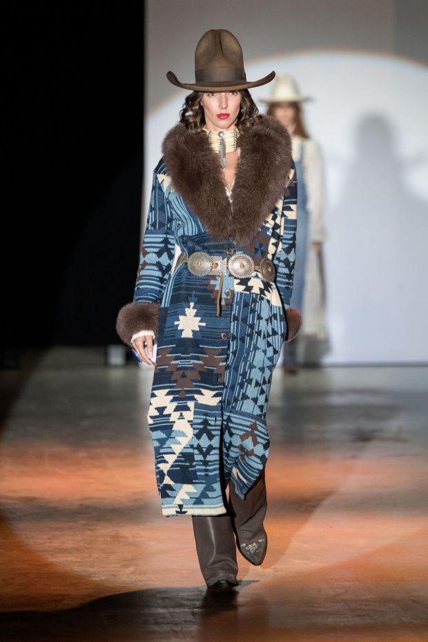 A model wears a fur-trimmed Double D Ranchwear coat during the fashion show. (Jensen Sutta, Special to The Denver Post)