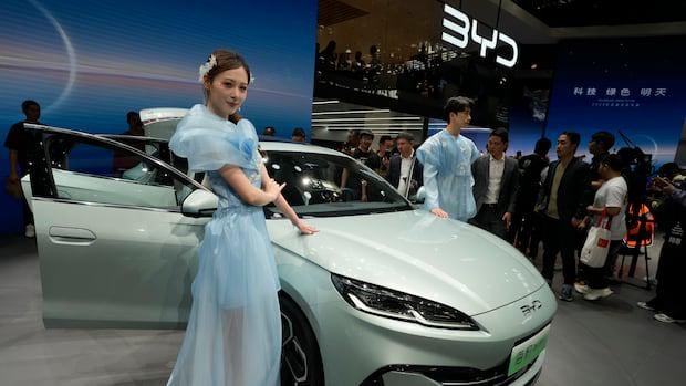 Chinese EVs are coming to Canada. How soon will they be here? How much will they cost? | CBC News
