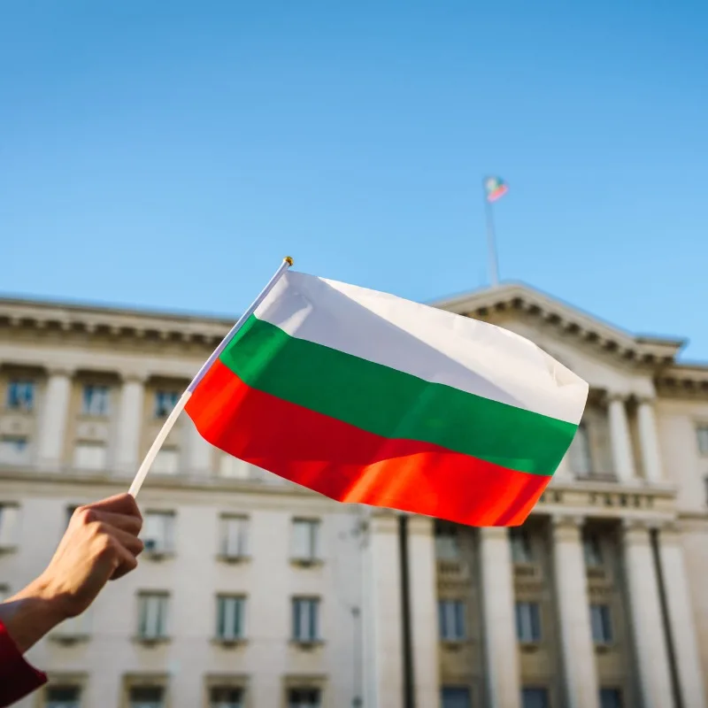 Woman Waving The Bulgarian Flag In Central Sofia, Bulgaria, Eastern Europe