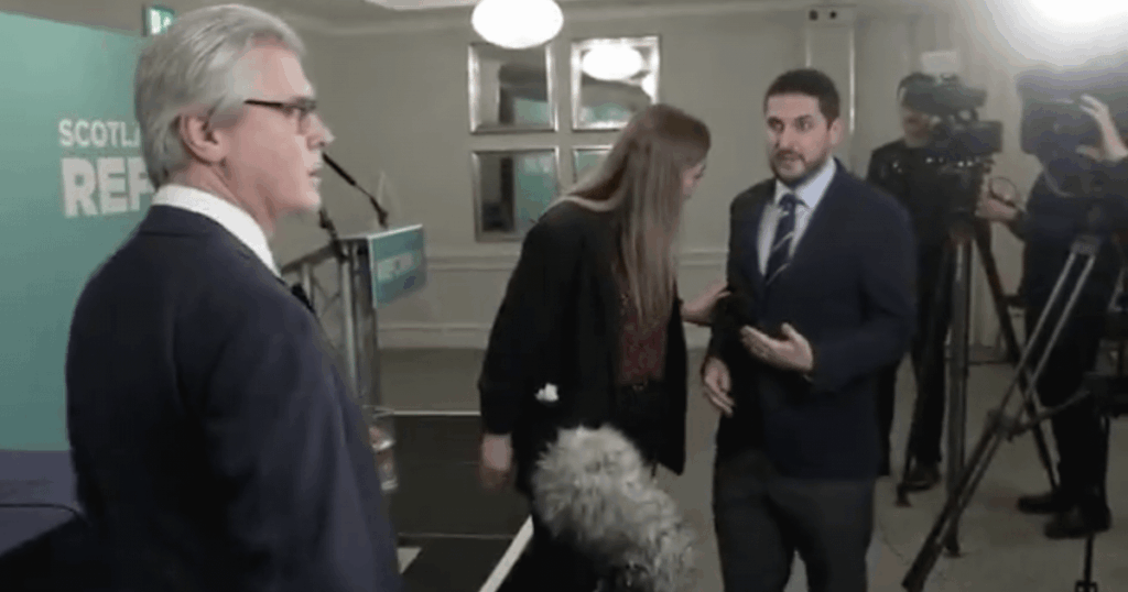 Reform UK staffer grabs journalist and tells him to move on from his line of questioning
