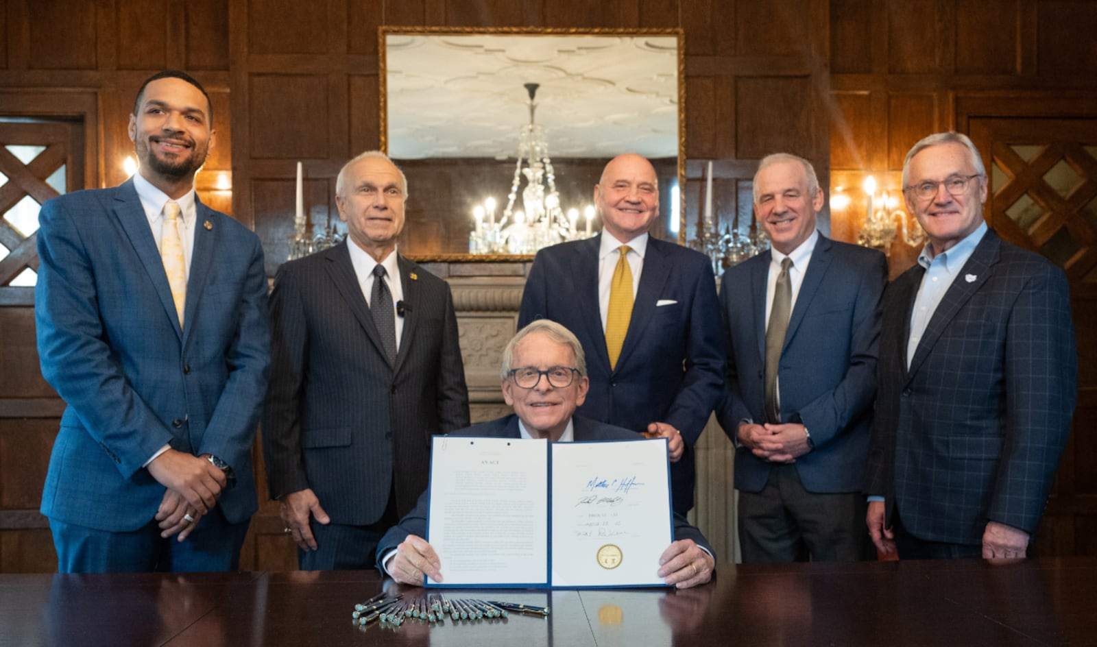 Ohio Republican leaders mark the signing of Senate Bill 1 on Friday, March 28, 2025, to ban diversity, equity and inclusion programs from Ohio public colleges. From left are State Rep. Josh Williams, State Sen. Jerry Cirino, Governor Mike DeWine, State Rep. Tom Young, House Speaker Matt Huffman and Lt. Governor Jim Tressel. CONTRIBUTED PHOTO