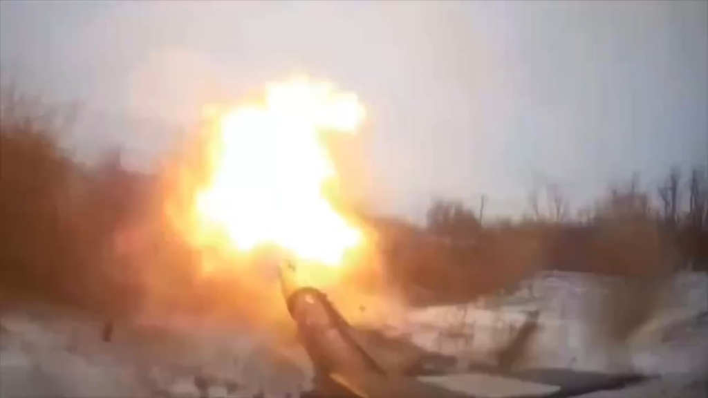 A Ukrainian T-72B tank fires at close range at a landing site containing Russian infantry near Seversk. At 0:12 and 0:22, the tank withstands FPV drone strikes.