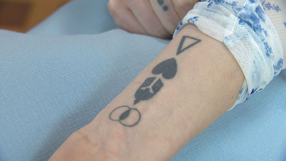 This is Amanda’s tattoo that illustrates her method to have a constructive conversation with someone you disagree with. (KOMO)