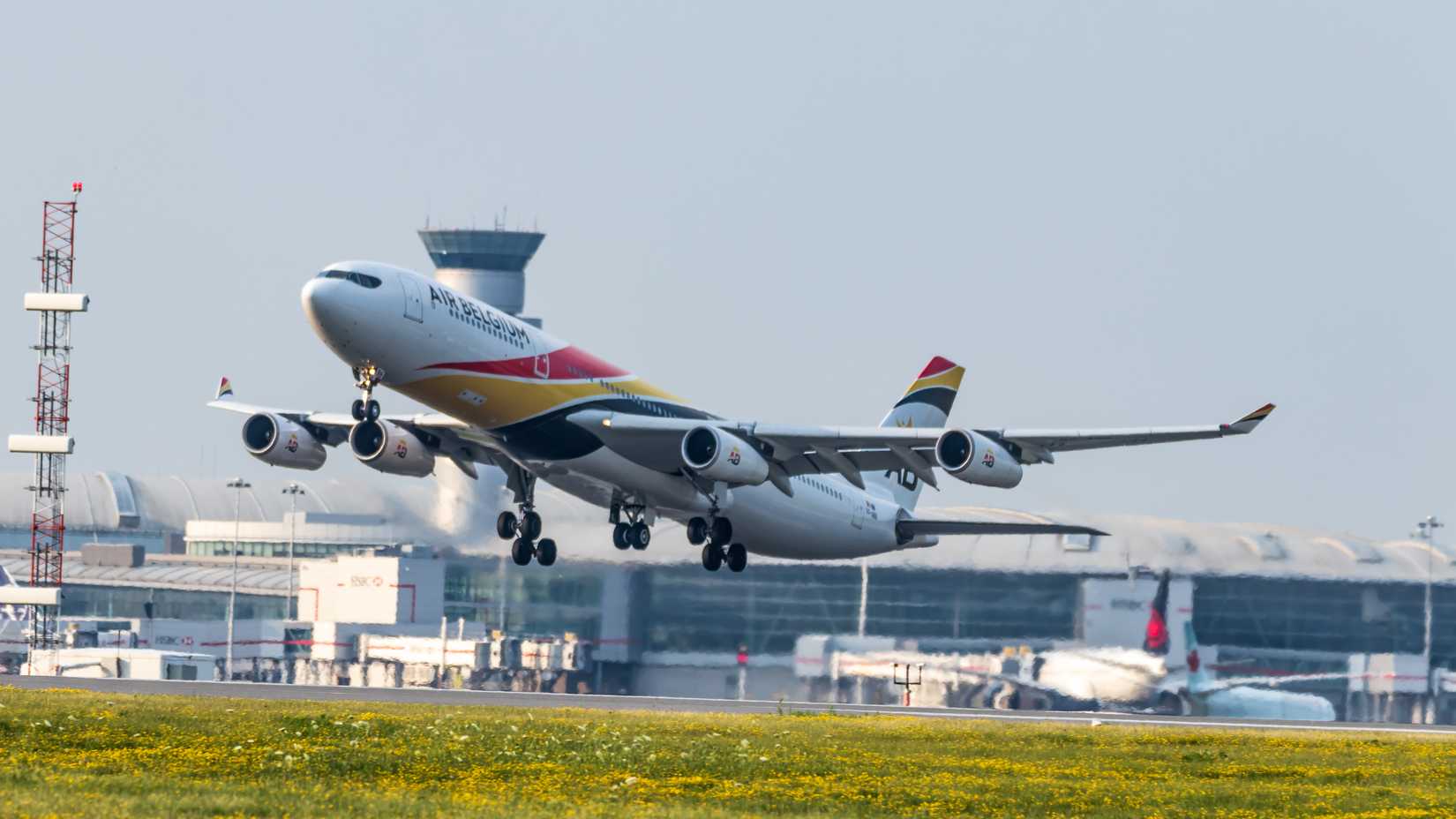 Air Belgium Airbus A340 operated by British Airways lifting off from Toronto Pearson Intl. Airport.