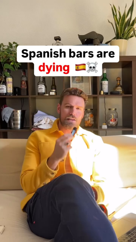 A guiri is "saving barrios" by going to a different bar each month and buying some drinks.