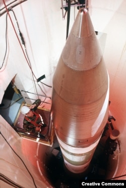A worker inspects a Minuteman III missile inside a silo in North Dakota in 1989.