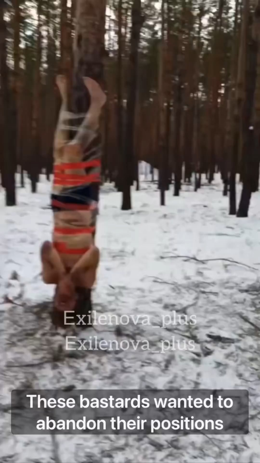 Russian troops torture their own soldiers by taping them upside down to trees in freezing cold and forcing them to eat snow as punishment