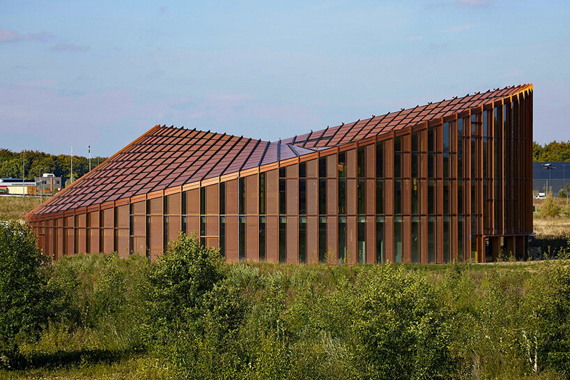 dancers take over dymak HQ in denmark by bjarke ingels group