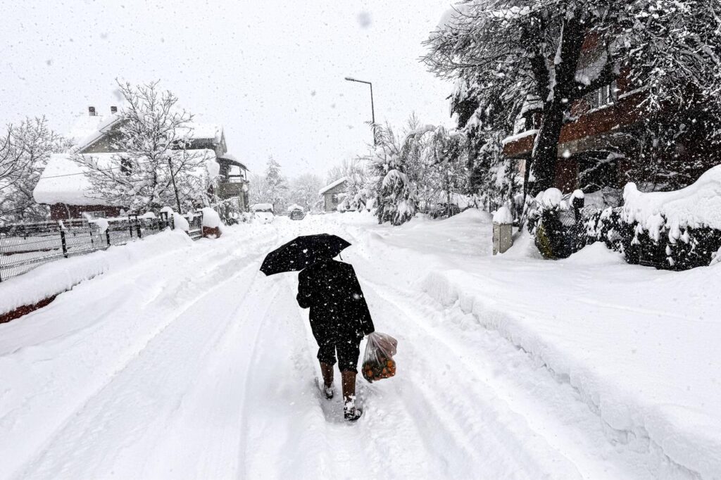 A pedestrian walking through heavy snowfall in Bolu, Türkiye. (AA Photo)