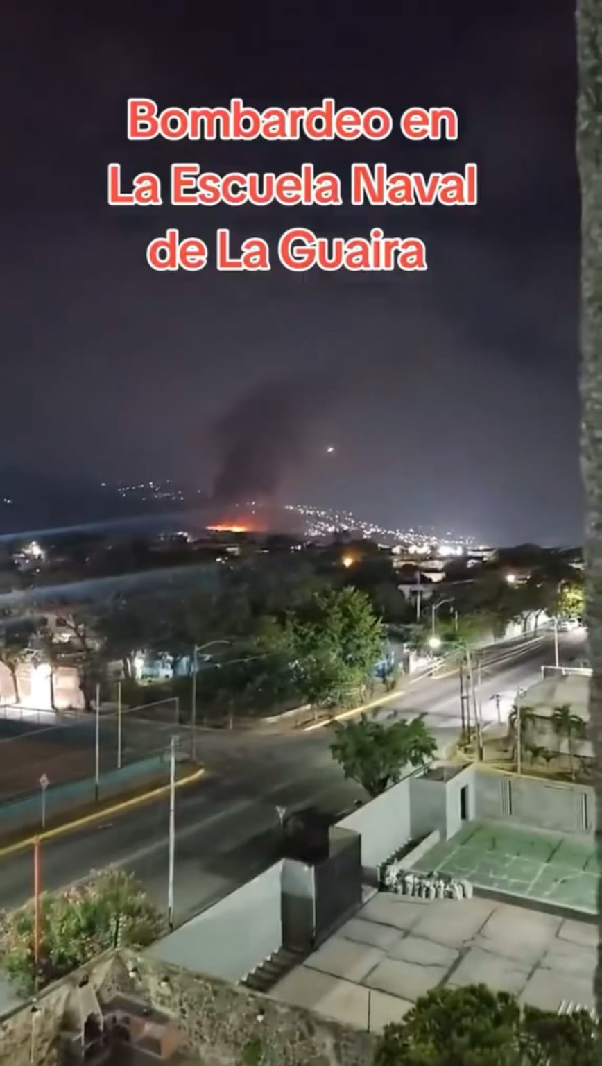 The naval school in Guaira (Venezuela) burning after it was hit by an American strike, with what may be a Buk-M2E launch in the background