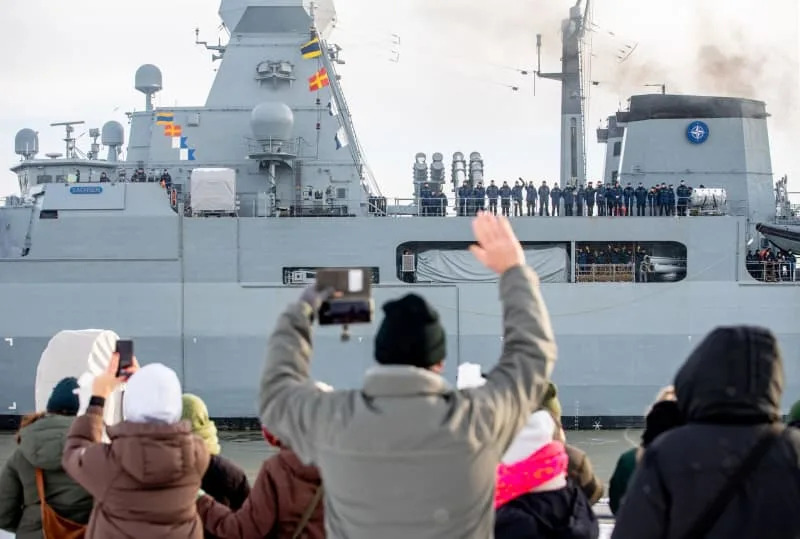 Members of the crew wave as the frigate "Sachsen" (F 219) leaves the port at the naval base for a deployment lasting several months. The naval vessel will be part of the so-called Standing Nato Maritime Group 1, a Nato maritime task force, operating in the North Sea, Baltic Sea and Atlantic. Hauke-Christian Dittrich/dpa