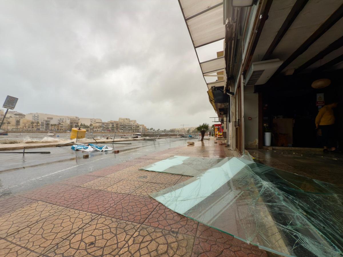 Sharp glass shards on the Marsascala front are what remains of a coffee shop's glass frontage on Triq ix-Xatt. Photo: Jonathan Borg