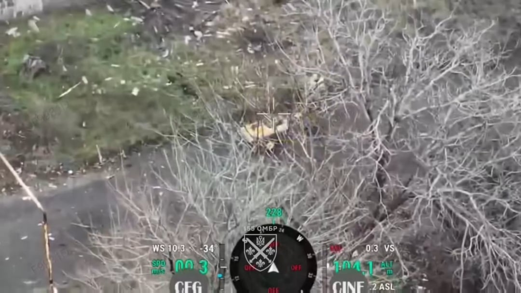 Russian spotted a Ukrainian drone above him, scratched “loser” on the ground, and decided to pick up a nearby mine