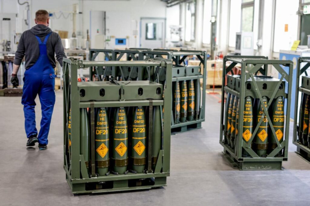 Photo shows a technician of German armaments company and automotive supplier Rheinmetall working on 155mm ammunition that will be delivered to Ukrainian Forces for the Panzerhaubitze 2000, a 155mm self-propelled howitzer, at the facility of Rheinmetall in Unterluess, northern Germany, on June 6, 2023. (AFP Photo)