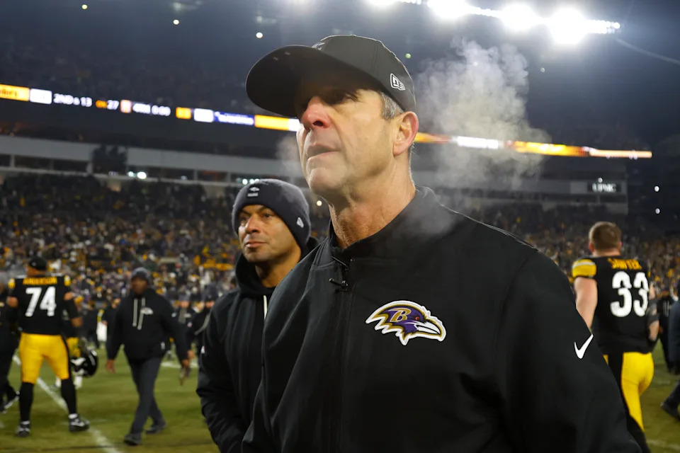 Harbaugh walks off the field after Sunday's loss in Pittsburgh. (Justin K. Aller/Getty Images)