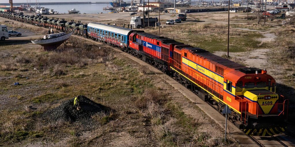 A train convoy with soldiers and VAMTACs of the Spanish Army from Greece to Romania A train convoy with soldiers and VAMTACs of the Spanish Army from Greece to Romania
