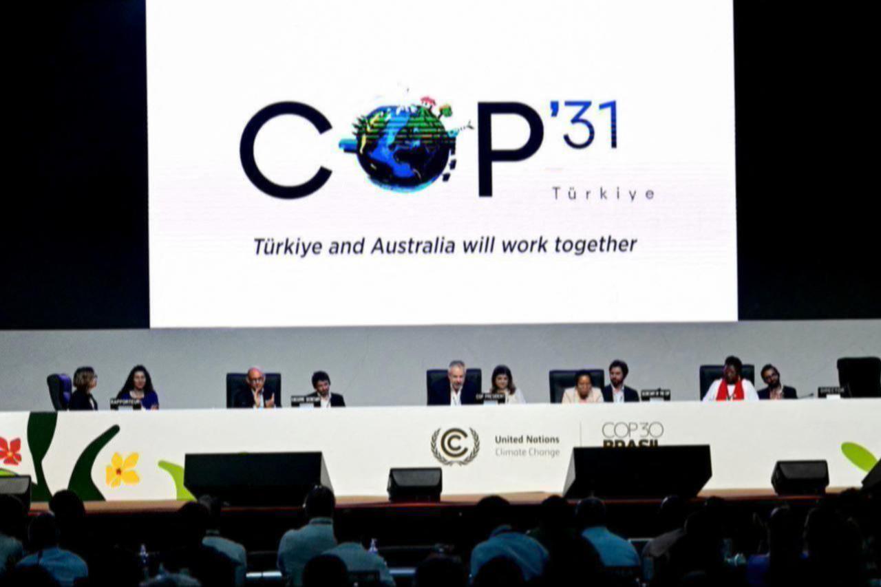 A screen shows the COP31 logo organized by Türkiye and Australia during the COP30 UN Climate Change Conference in Belem, Para state, Brazil on Nov. 22, 2025. (AFP Photo)