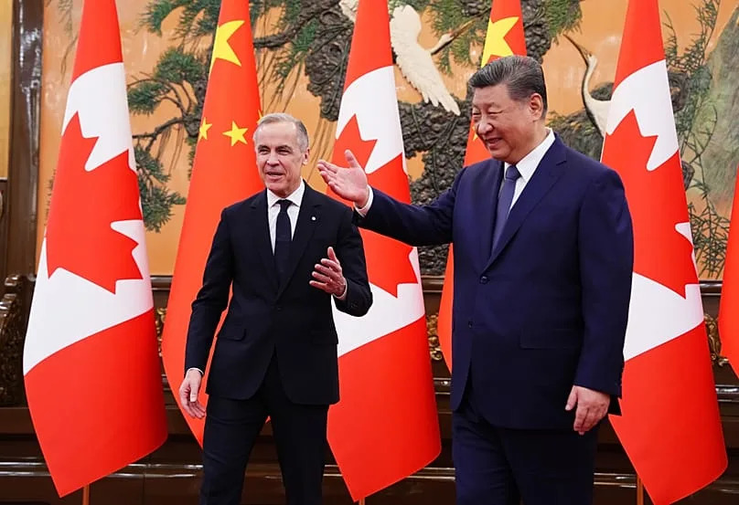Canadian Prime Minister Mark Carney, left, meets with President of China Xi Jinping at the Great Hall of the People in Beijing, China, on Friday, Jan. 16, 2026