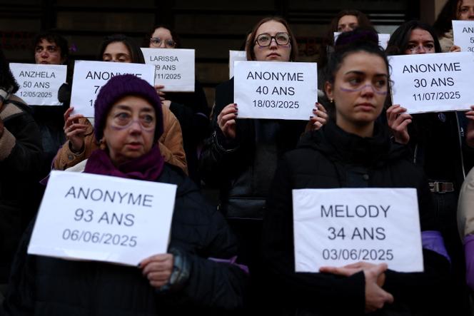 Protesters hold signs with the dates of femicide victims' deaths in Bordeaux, November 22, 2025.