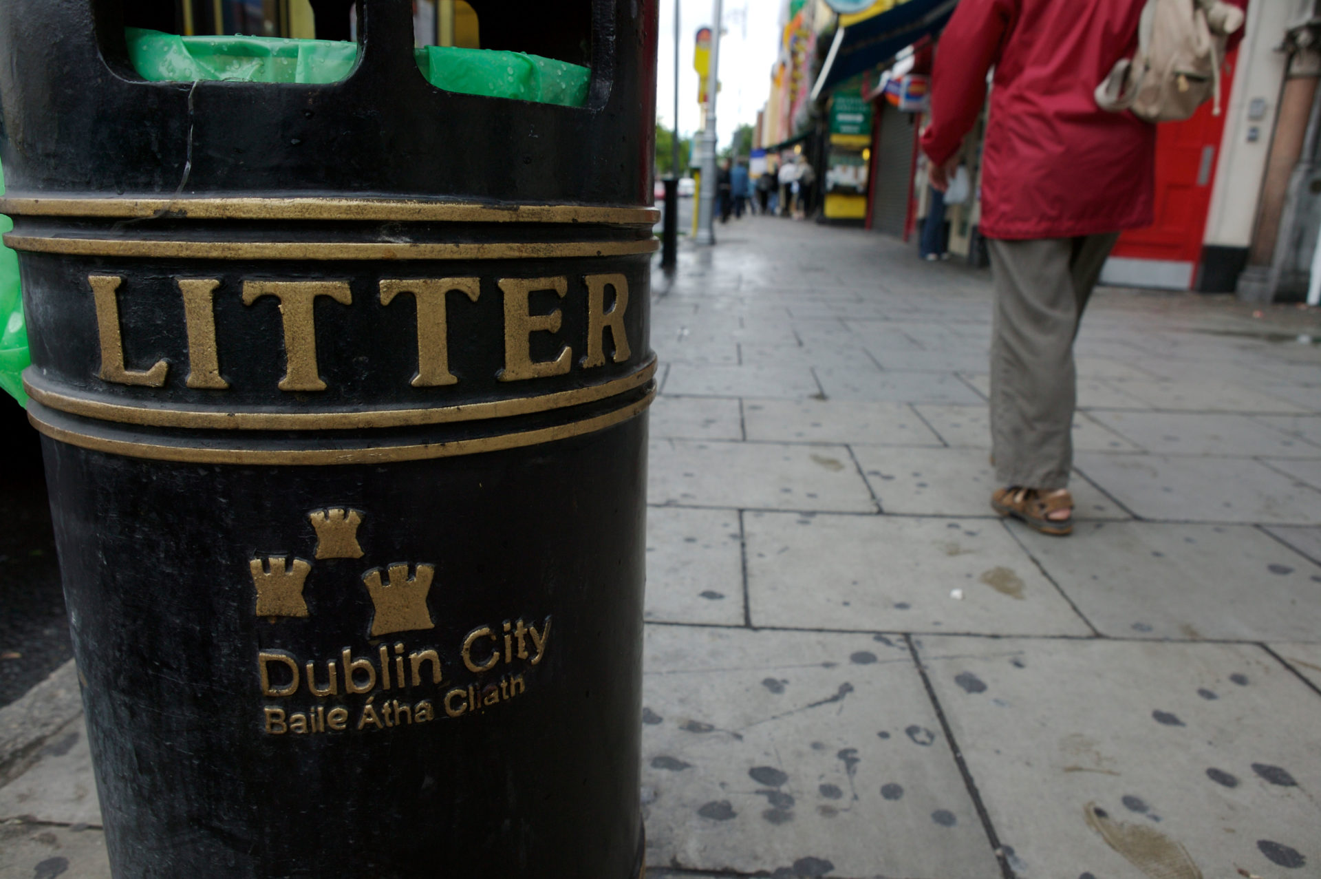 A person walking down the street in Dublin.
