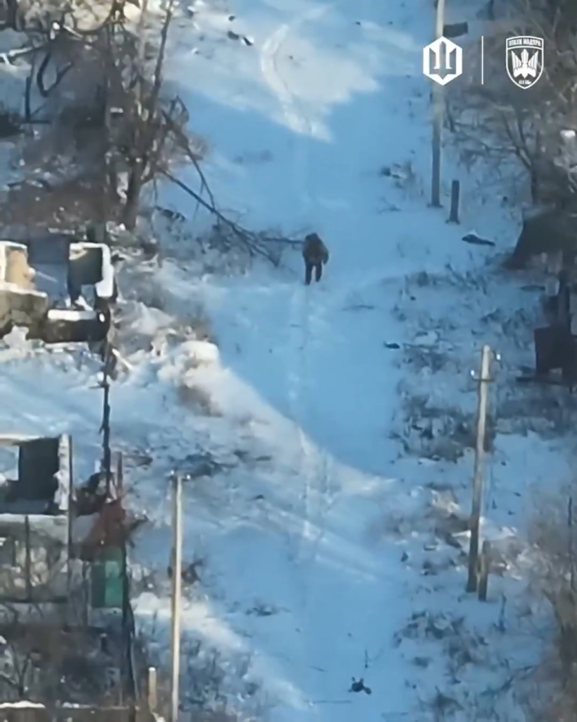 A russian soldier takes a break on a parkbench and is hit in the head by a drone of Madyars Birds, january 2026.