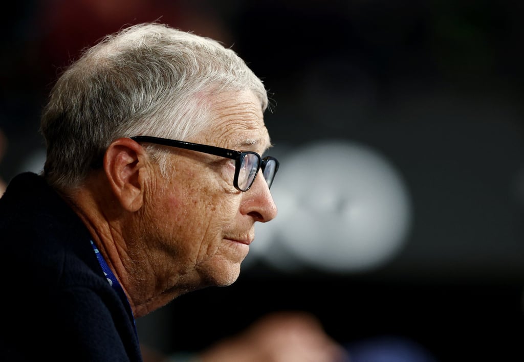 Bill Gates watches the Australian Open in Melbourne on Saturday. Photo: Reuters