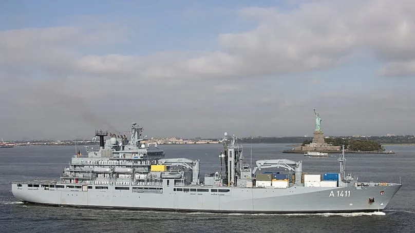 The Einsatzgruppenversorger "Berlin" in front of the Statue of Liberty