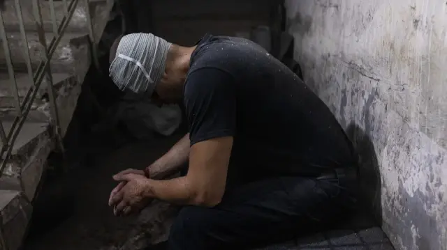 Russia and Ukraine accuse each other of deadly attacks on civilians flag