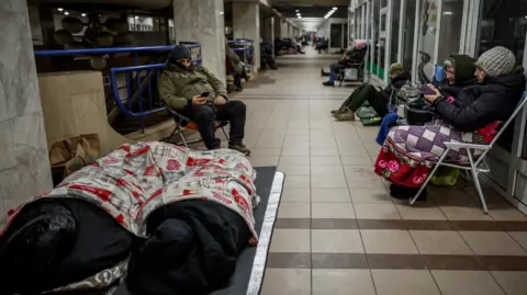 Reuters People sleeping in a metro station in Kyiv